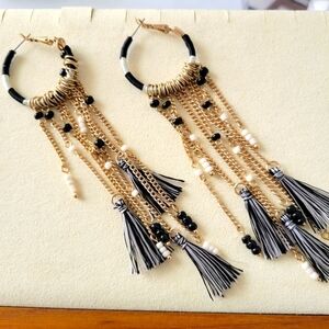 Goldtone Dangling Hoop Earrings •  Black & White Tassels